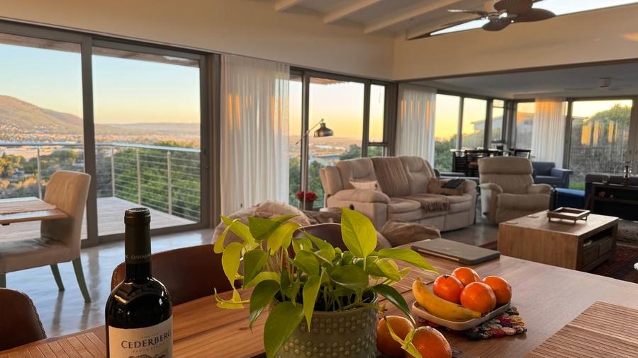 Dining table set for a meal at sunset